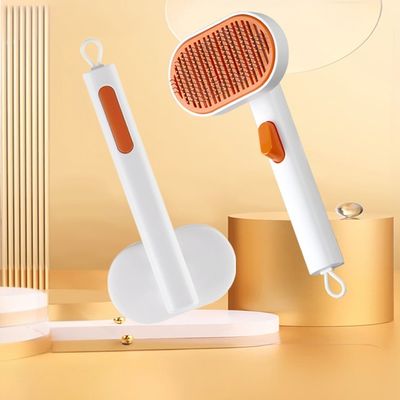Mua Chó nuôi chải loại bỏ lông dụng cụ trang điểm mèo một nút Slicker tự làm sạch chải sản xuất trực tuyến